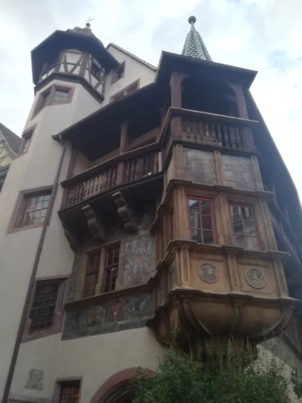 Folklore dancing in the evening at Colmar, Alsace (France)